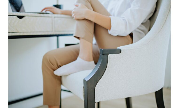 girl working from home in a elegant dining chair