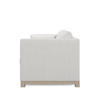 side view of modern condo sofa with wood base