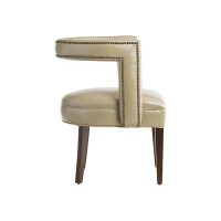 Side view of the 11182 Vogel chair in beige leather, but available in over 300 different fabrics, and showcased with nailhead trims and espresso wood finish.