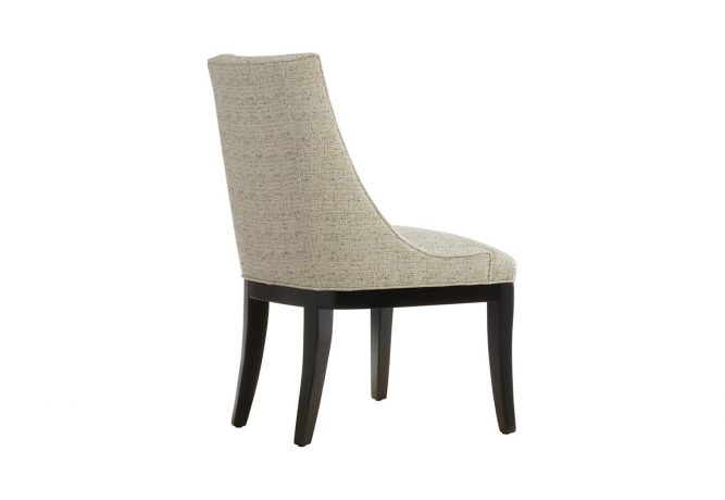 Rear view of a classic dining chair with curved back legs and back shaped to envelope your body.