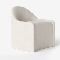 Angle view of the Amelia upholstered dining chair by Vogel. Made in Toronto, Ontario.