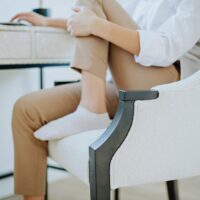 girl working from home in a elegant dining chair