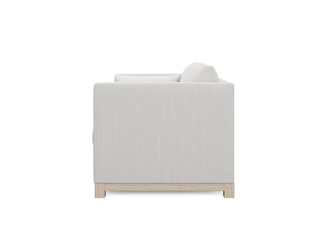 side view of white modern loveseat with oak wood base