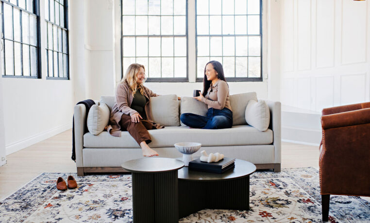 friends chatting on a custom canadian made modern sofa
