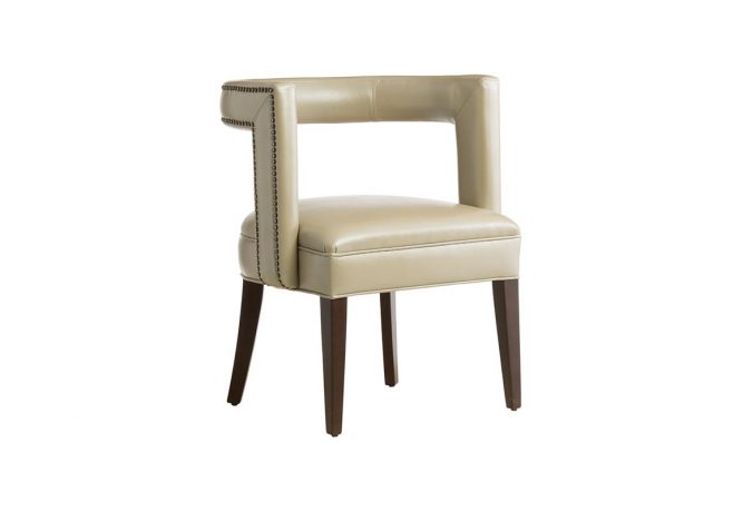 The 11182 transitional Accent Chair featuring a beige leather with nail head trim, espresso wood finish and flared legs and is manufactured in Toronto