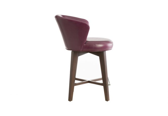 Side view of memory swivel contemporary bar stool in red by Vogel.