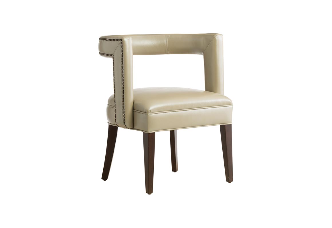 The 11182 transitional Accent Chair featuring a beige leather with nail head trim, espresso wood finish and flared legs and is manufactured in Toronto