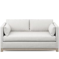 white modern loveseat with wood base and side pillows