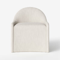 The Amelia upholstered dining chair by Vogel. Made in Toronto, Ontario.