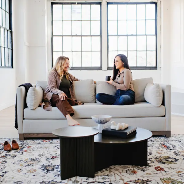 custom sofa with women lounging on it