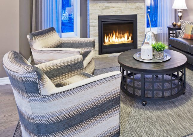 Vogel Clarissa Collection swivel chairs Canada made in a cozy room with a fireplace