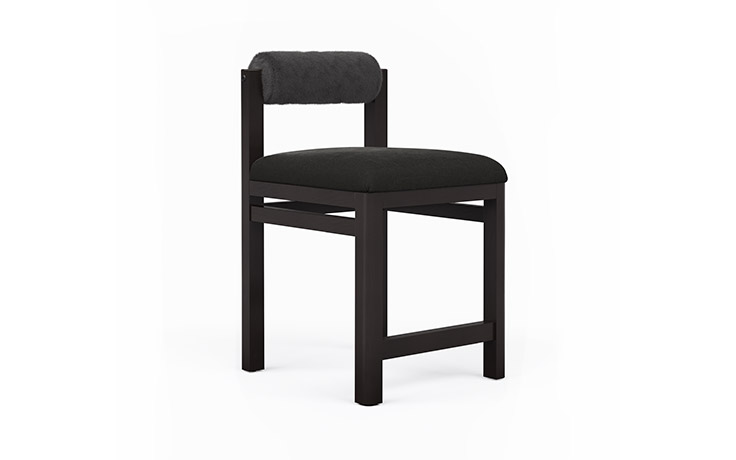 Angled view of the black marlowe counter stool by Vogel.