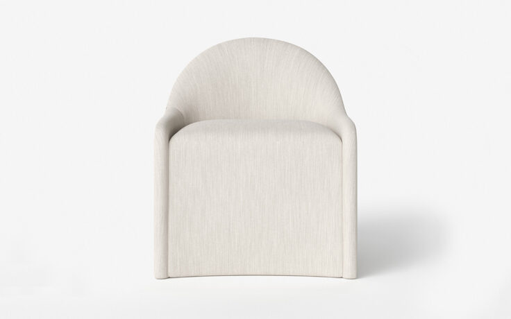 The Amelia upholstered dining chair by Vogel. Made in Toronto, Ontario.