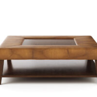 The traditional-style Kingston Ottoman made by Vogel in light brown leather with a wooden shelf and wood accents