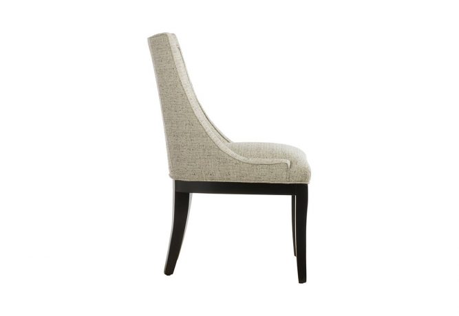 Side view of the 11181 dining chair by Vogel made in Toronto, ON and allows you to choose you fabric and wood finish.