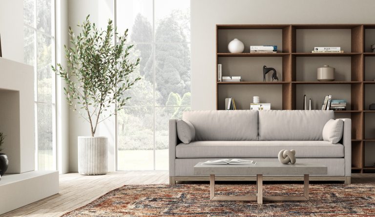 scandinavian style sofa with wood base and a cream fabric